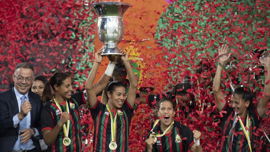 AS FAR of Morocco celebrate winning the 2022 Women's Africa Champions League, holding aloft the trophy