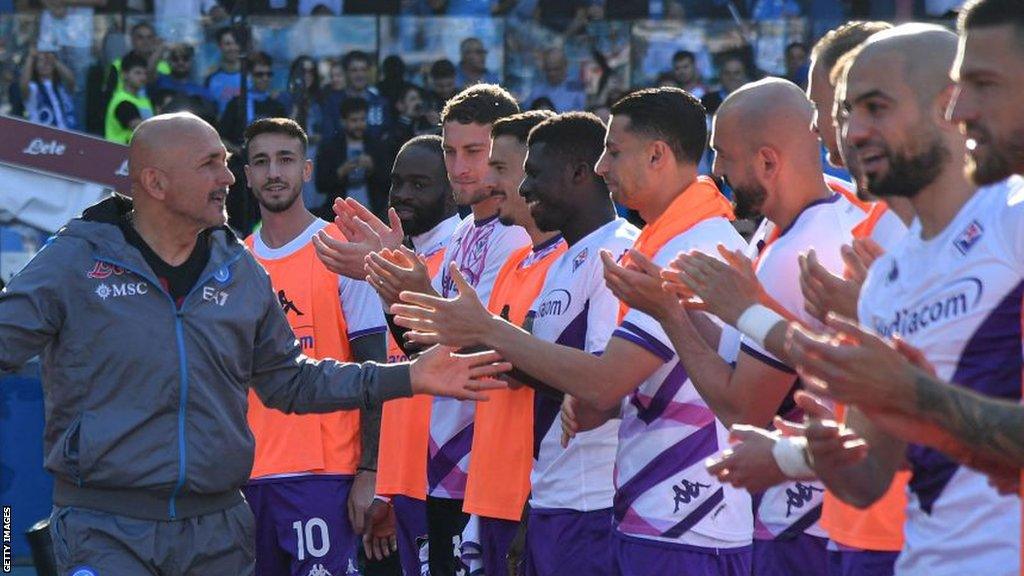 Napoli players are given a guard of honour