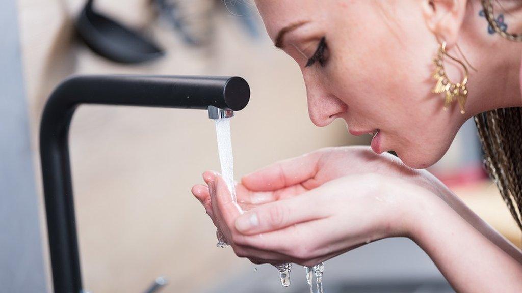 Woman drinking water