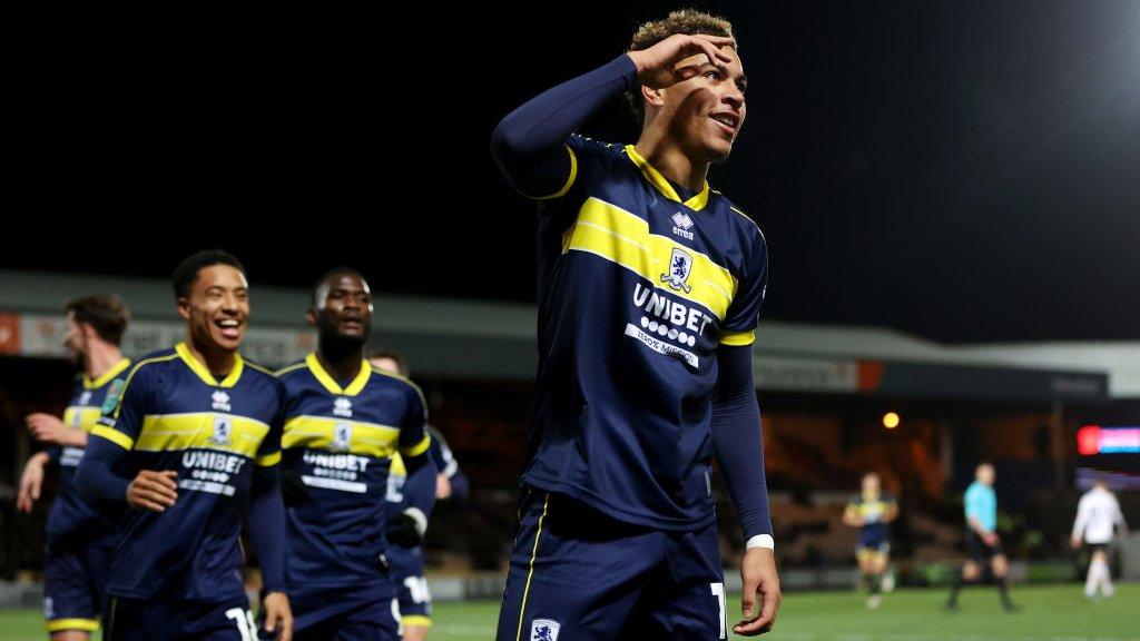 Middlesbrough's Morgan Rogers celebrates scoring at Vale Park