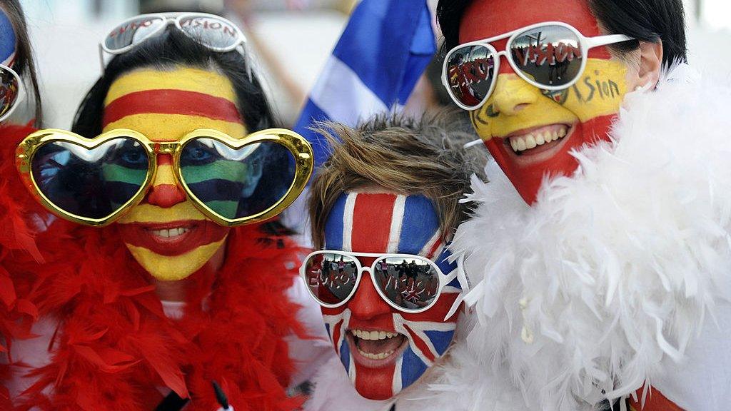 Eurovision fans with faces painted to represent different countries' flags