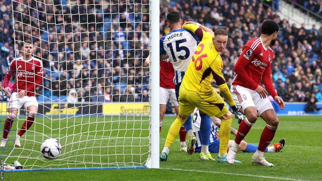 Matz Sels of Nottingham Forest looks on as Andrew Omobamidele of Nottingham Forest scores an own-goal