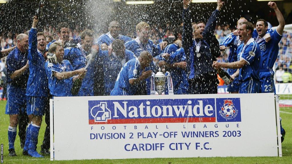 Cardiff City players celebrate promotion