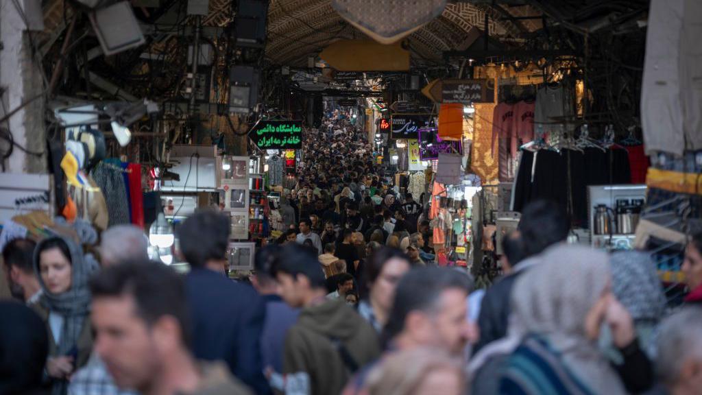 A busy market with people shopping