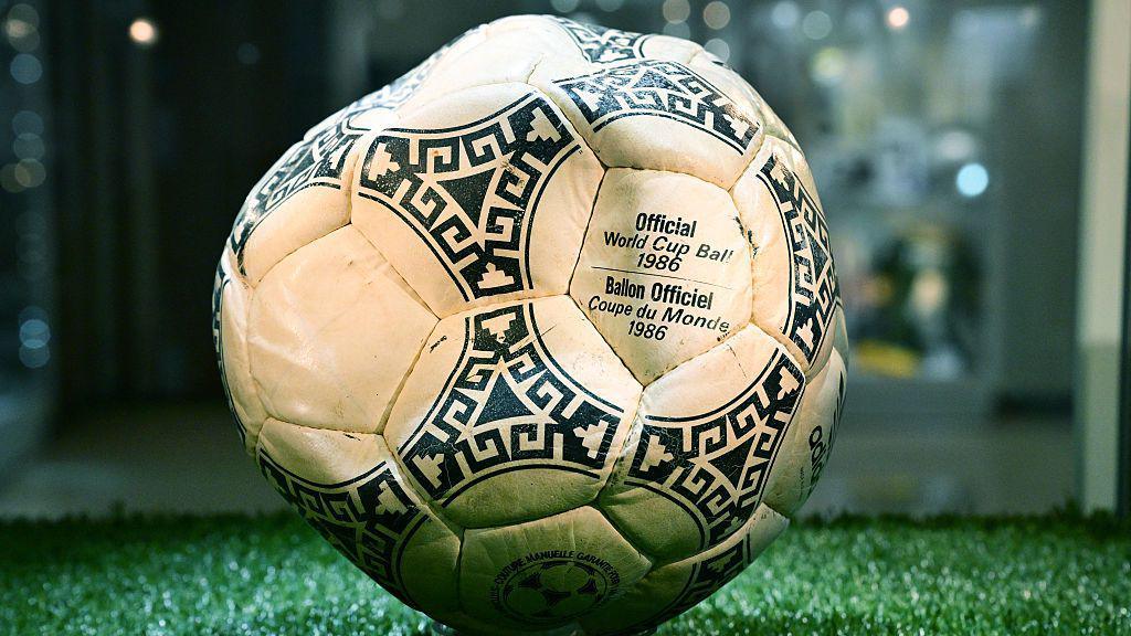 A black and white football with Official World Cup Ball 1986 written on it.