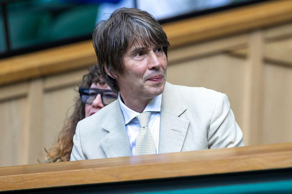 Brian Cox watches on from the Wimbledon Centre Court royal box