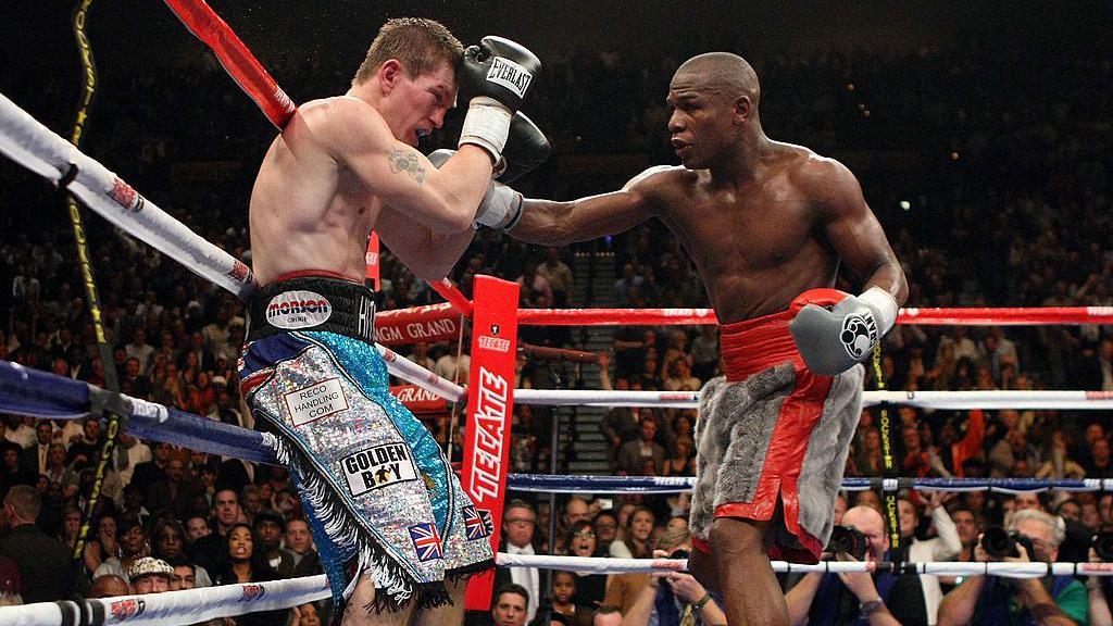 Ricky Hatton defends against a Floyd Mayweather jab during their title fight at the MGM Grand in Las Vegas in 2007