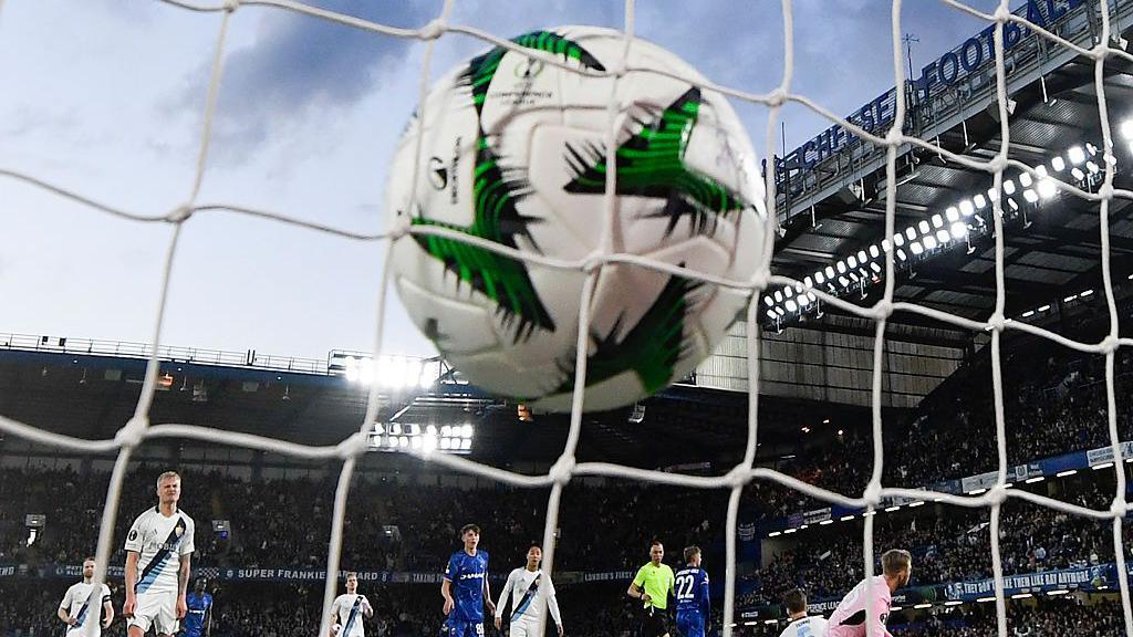 Players react after Chelsea's scored their opening goal.