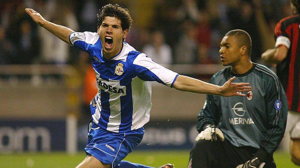 Albert Luque celebrates scoring against AC Milan