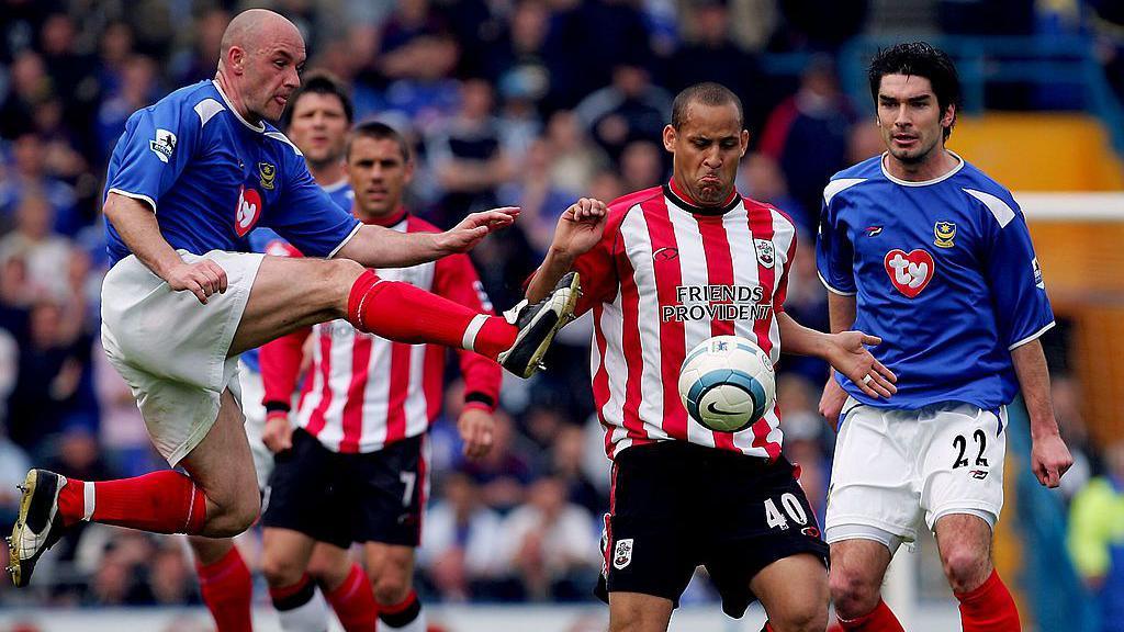 Portsmouth's Steve Stone challenges Southampton's Nigel Quashie during a league meeting in 2005