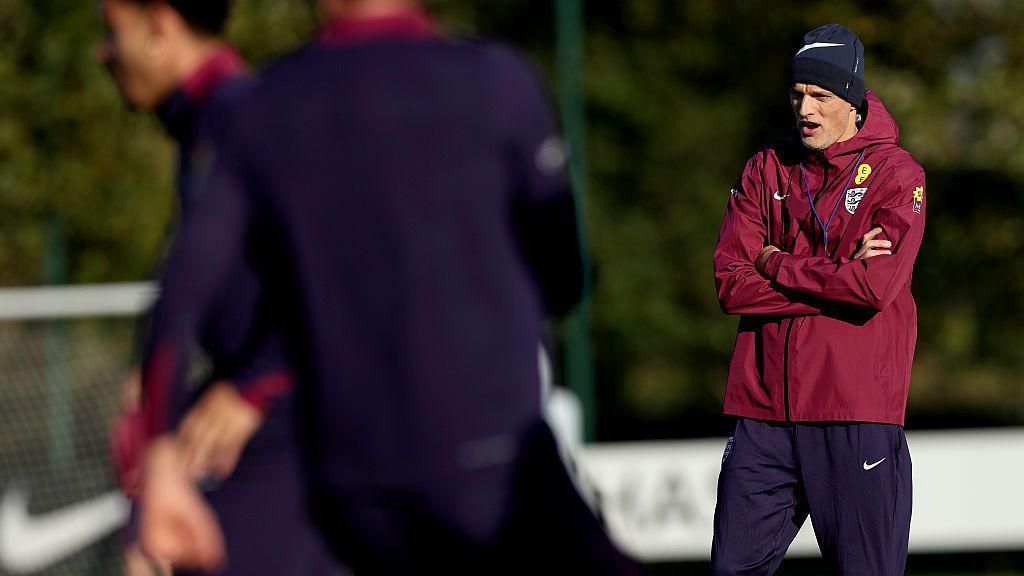 Thomas Tuchel watches on as England train
