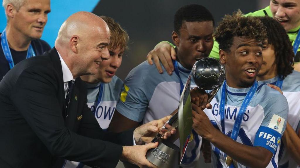 Angel Gomes lifting the 2017 Under-17s World Cup trophy