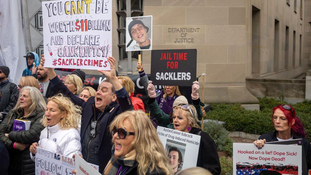 People from across the United States, who lost loved ones due to the opioid epidemic, rallied at the Department of Justice in Washington DC, calling on Attorney General Merrick Garland and Deputy AG Lisa Monaco to bring criminal charges against members of the Sackler family in 2021.