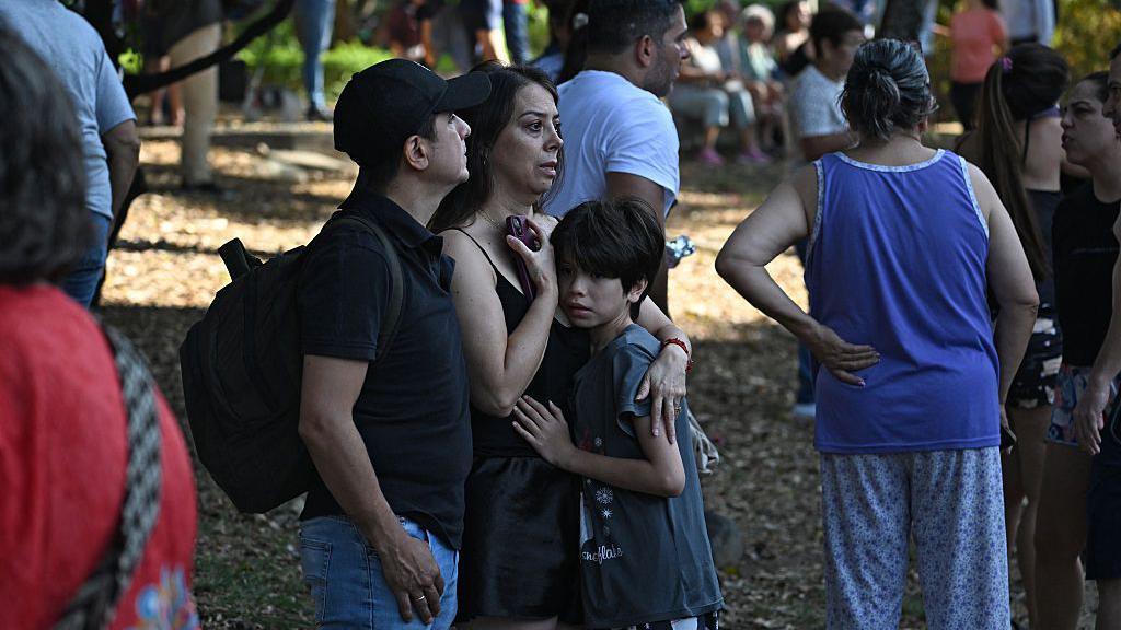 People react after earthquake in Colombia