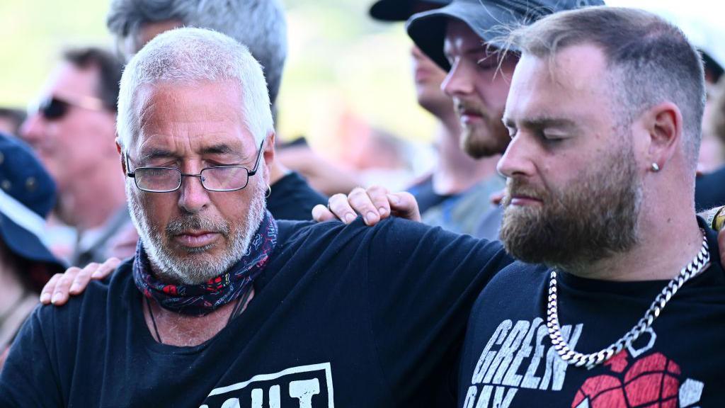 Fans hold a moment of silence at Glastonbury