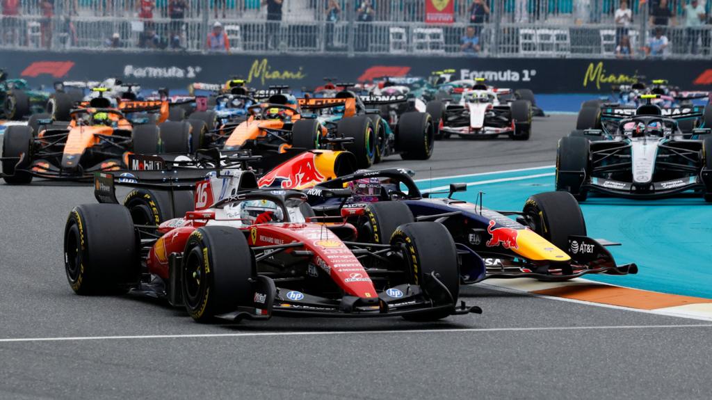 Charles Leclerc leads the Miami Grand Prix through the first corner as Max Verstappen loses control and spins