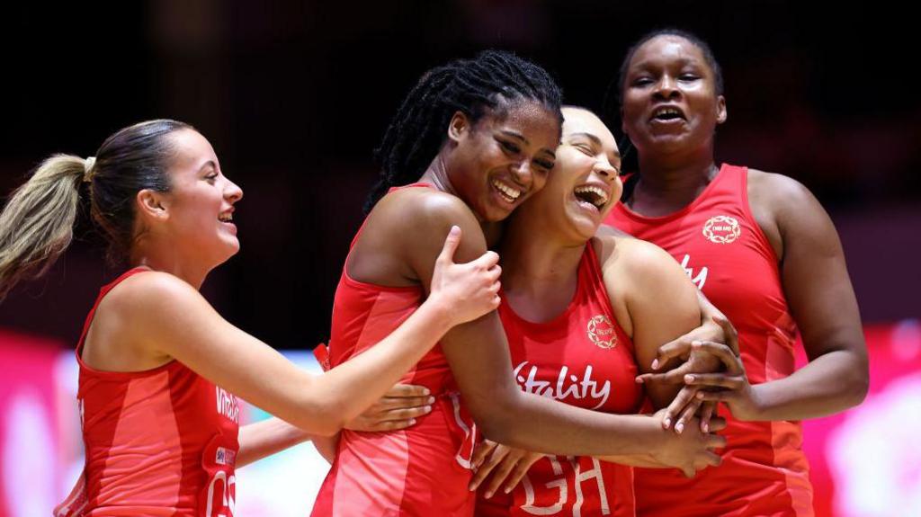 England's Olivia Tchine, Paige Reed and Berri Neil celebrate the team winning the final during Vitality Netball Nations Cup