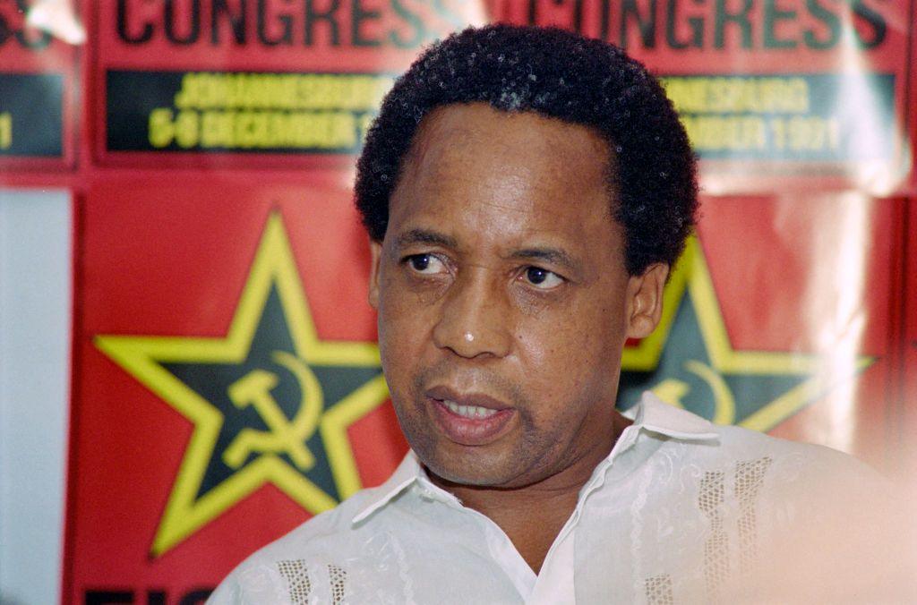 Chris Hani wearing a white shirt 