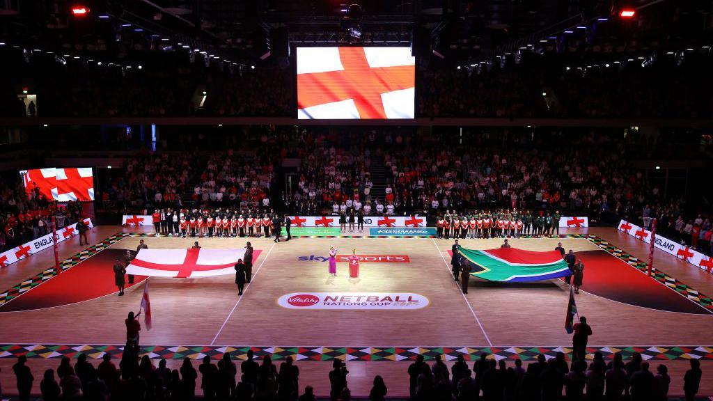 Both teams observe the national anthem during Vitality Netball Nations Cup Final