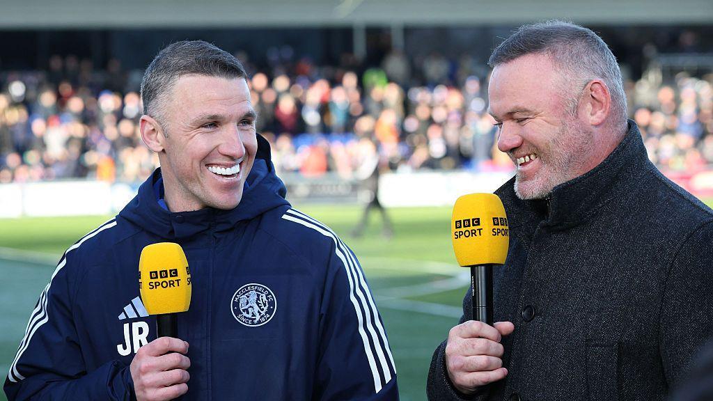 john rooney on the left and wayne rooney on the right, both holoding yellow bbc sport branded microphones