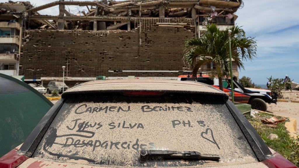 A list of names of missing persons is written on a car in an area affected by the earthquake in Catia La Mar, Venezuela, 28 June 2026.