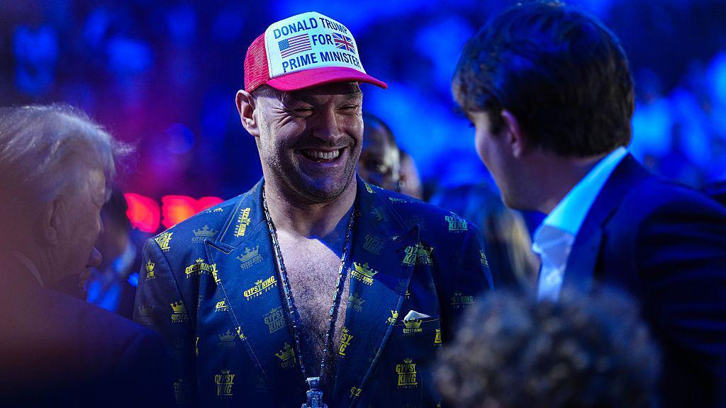 Tyson Fury at the UFC's White House event in a baseball cap that carries the message 'Donald Trump for Prime Minister'