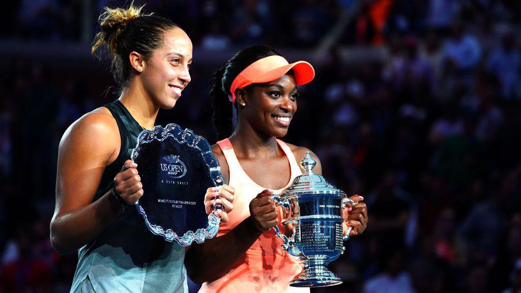 USA Madison Keys with finalist trophy and Sloane Stephens (R) holding up US Open trophy