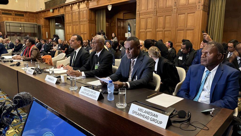 Ralph Regenvanu (4th R), Vanuatu's Special Envoy on Climate Change and the Environment, Arnold Kiel Loughman (3rd R), Attorney General of Vanuatu and Ilan Kiloe (2nd R), Legal Advisor to the Melanesian Vanguard Group, and Gregoire Nimbtik, Deputy Director General of the Melanesian Pioneer Group (R) attend the advisory opinion sessions at the International Court of Justice (ICJ) to determine states' obligations on climate in the Hague, Netherlands on December 2, 2024.