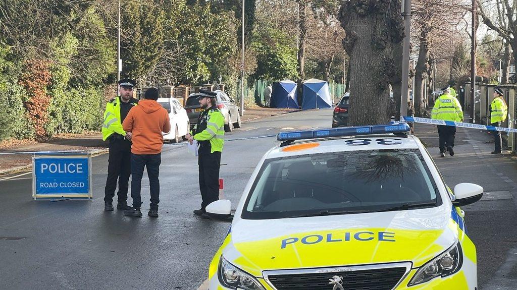 Police activity on a road in Reading