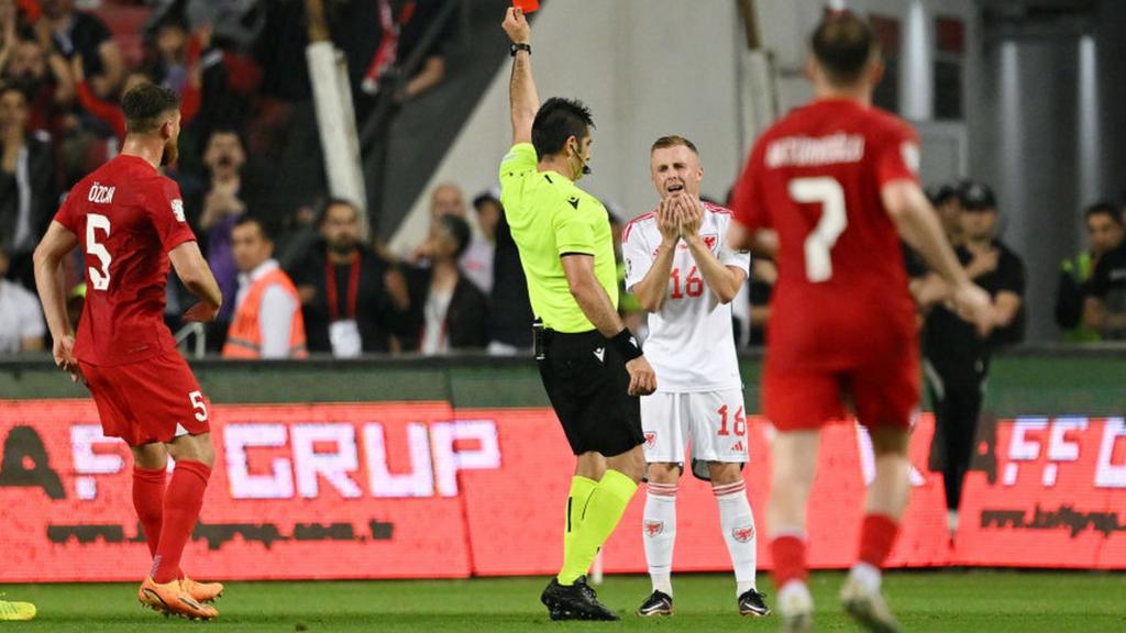 Referee shows red card