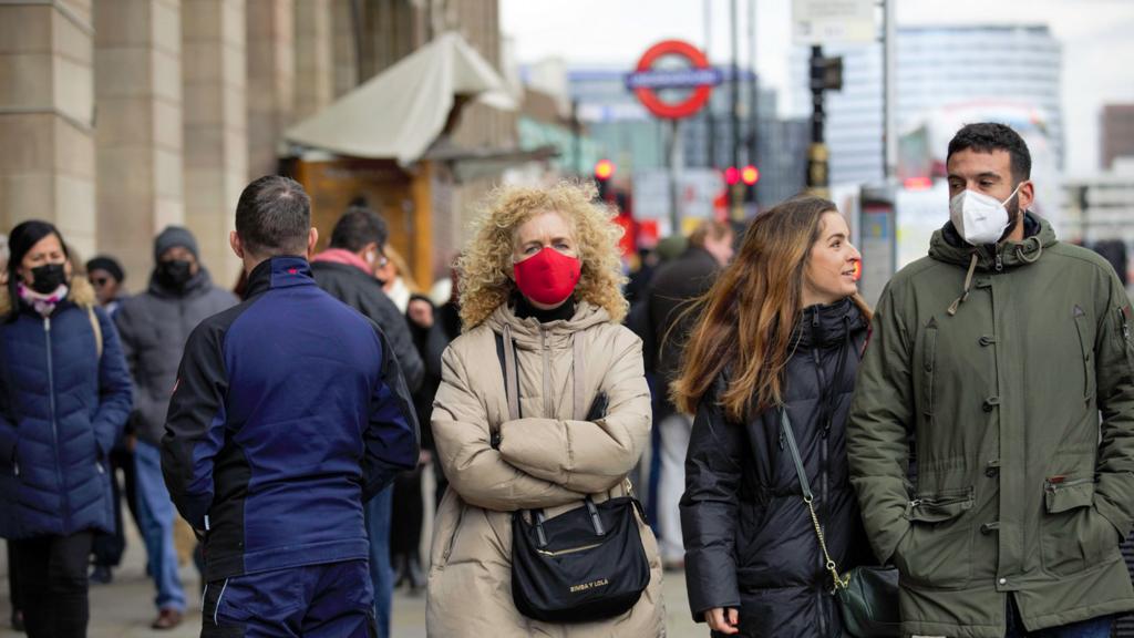 crowds with masks