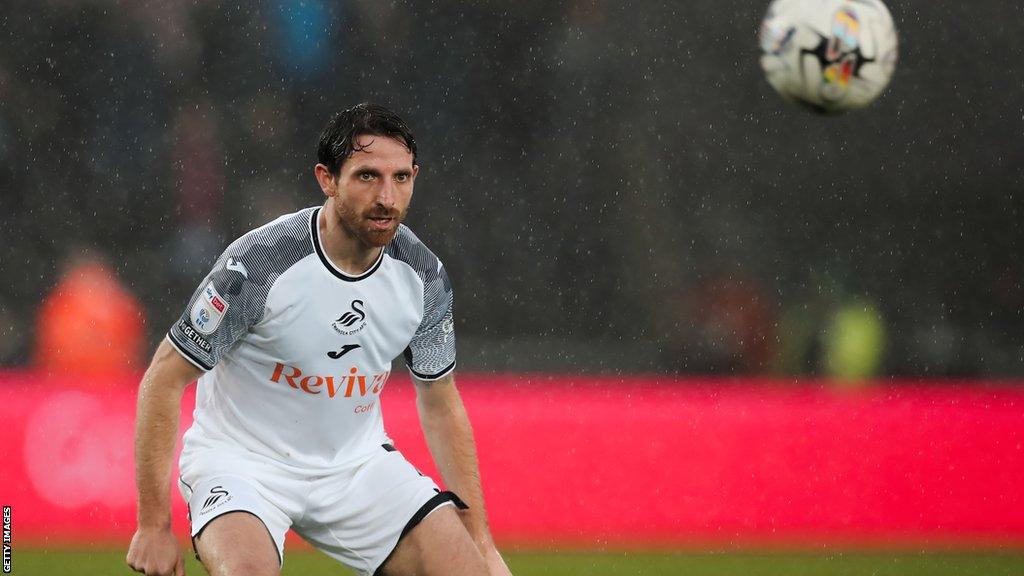 Joe Allen in action for Swansea earlier this season