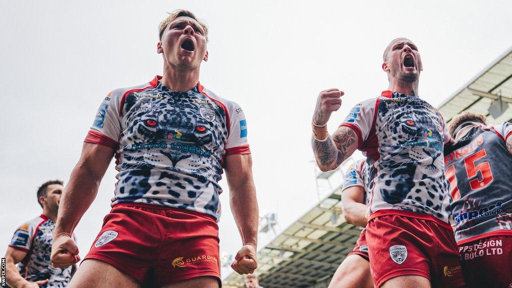 Lachlan Lam and Zak Hardaker celebrate after the semi-final win over St Helens