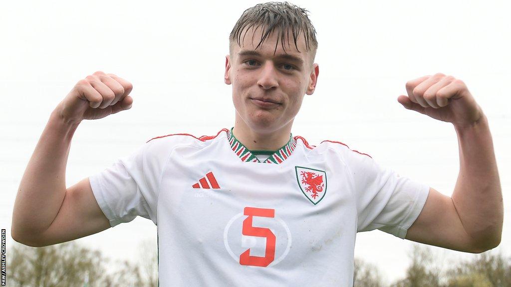 Cardiff City's Dylan Lawlor celebrates after scoring the goal which secured Wales' qualification