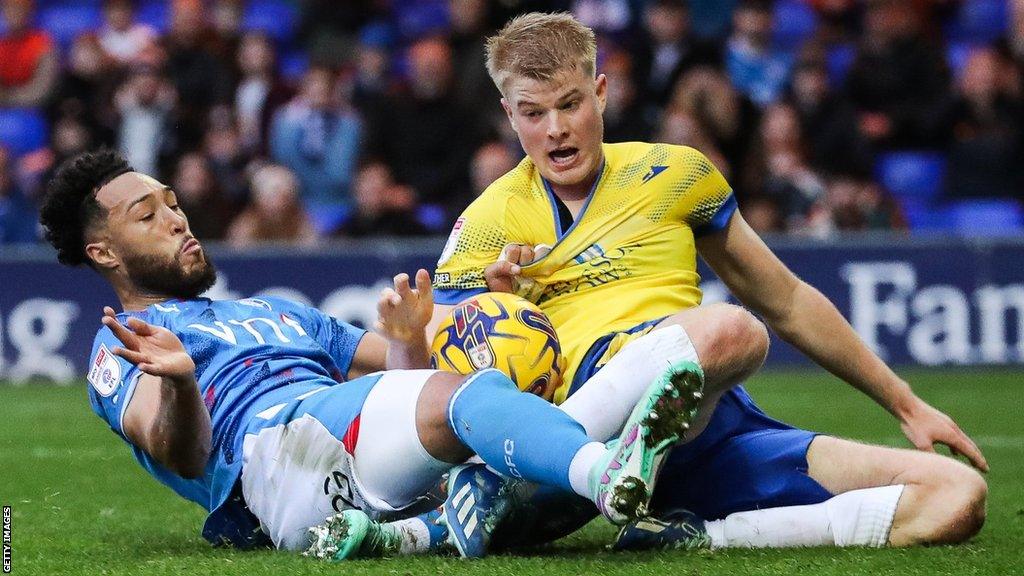 Kyle Wootton forces home Stockport's first goal against Colchester