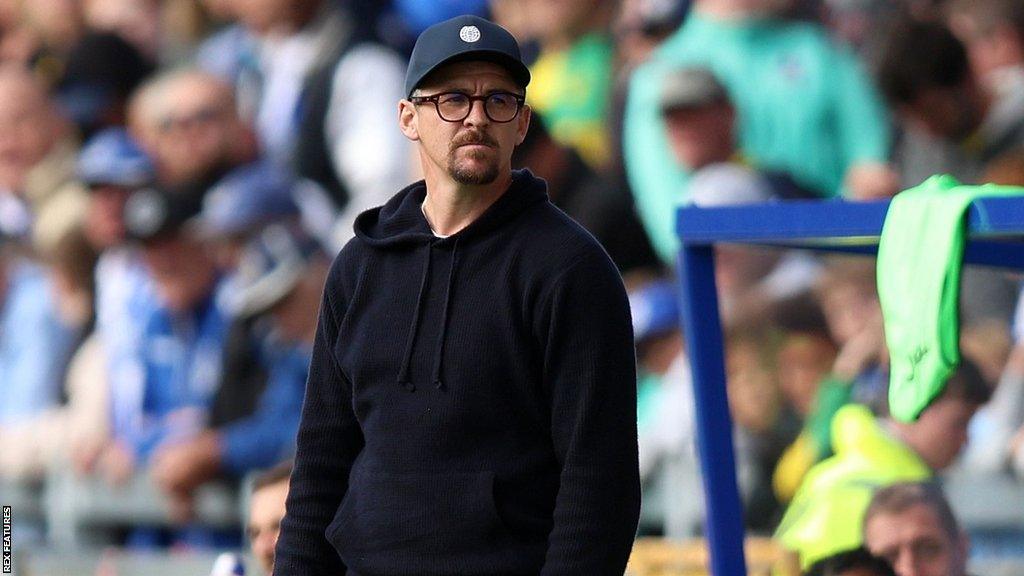 Joey Barton looks on from the dugout during a Bristol Rovers match this season