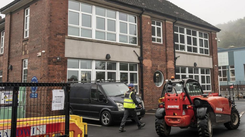 Workmen at a school in Sheffield