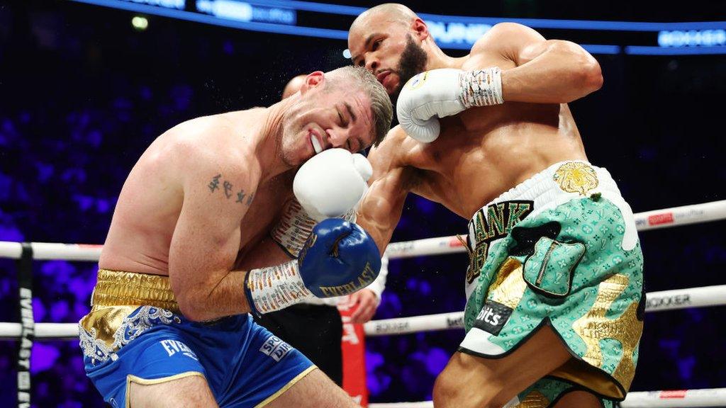 Chris Eubank Jr lands an uppercut on Liam Smith