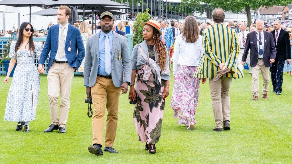 A group of people arriving at the event