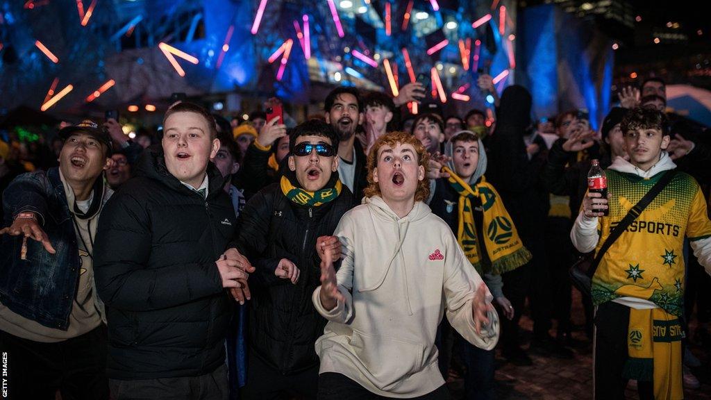 Australia fans celebrate in fan park in Melbourne