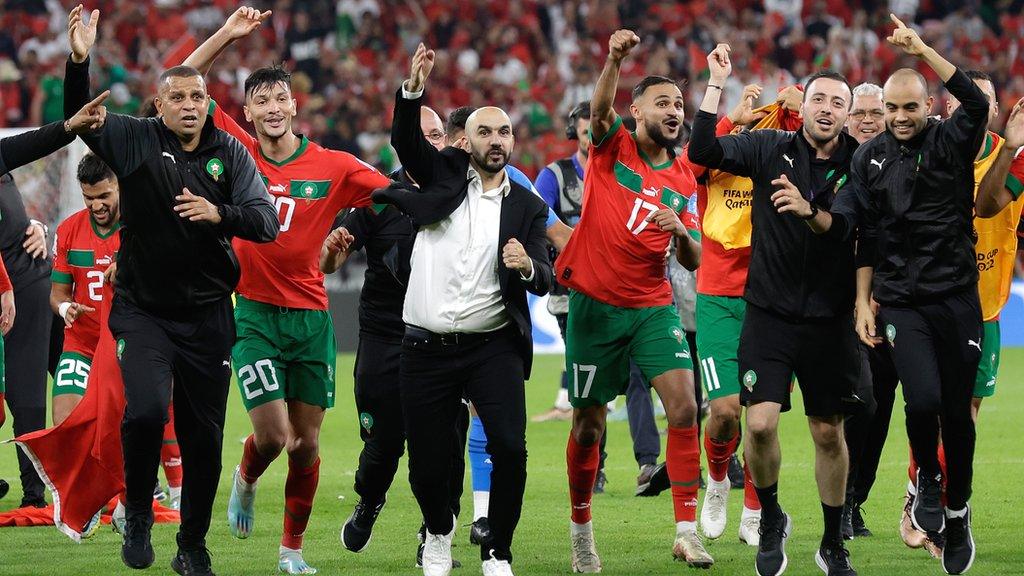 Walid Regragui leads the celebrations after Morocco became the first African team to reach a World Cup semi-final