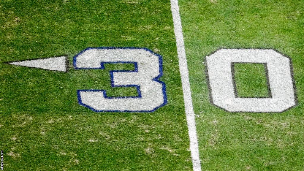 The number three is sprayed with a blue outline in the colour of the Buffalo Bills to honour Damar Hamlin