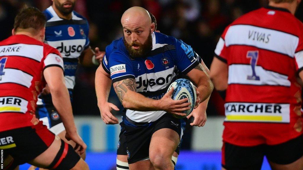 Tom Dunn runs with the ball during Bath's match with Gloucester this season