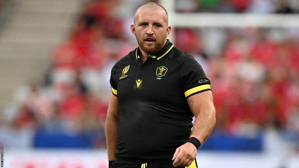 Dillon Lewis on the pitch for Wales during their World Cup group game against Portugal