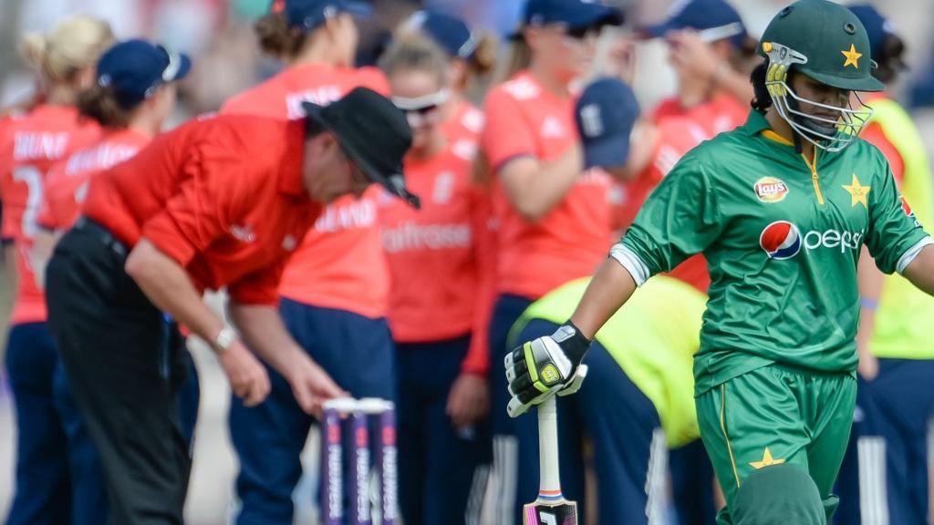 England celebrate taking their first wicket