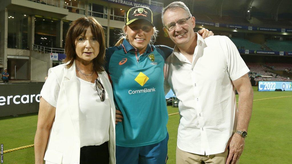 Kim Garth with her parents after winning his first Australian cap