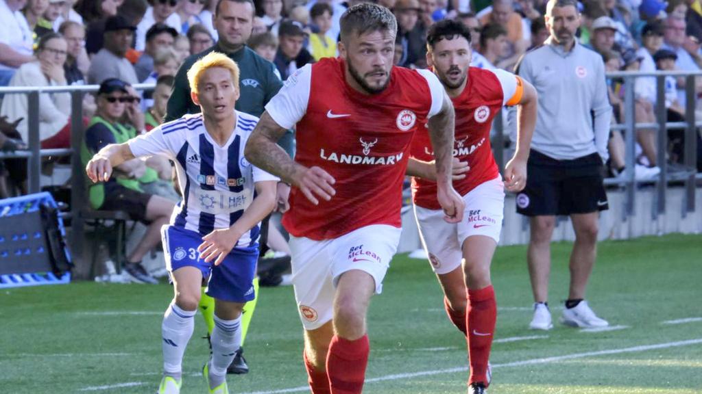 Larne’s Andy Ryan in action against HJK Helsinki
