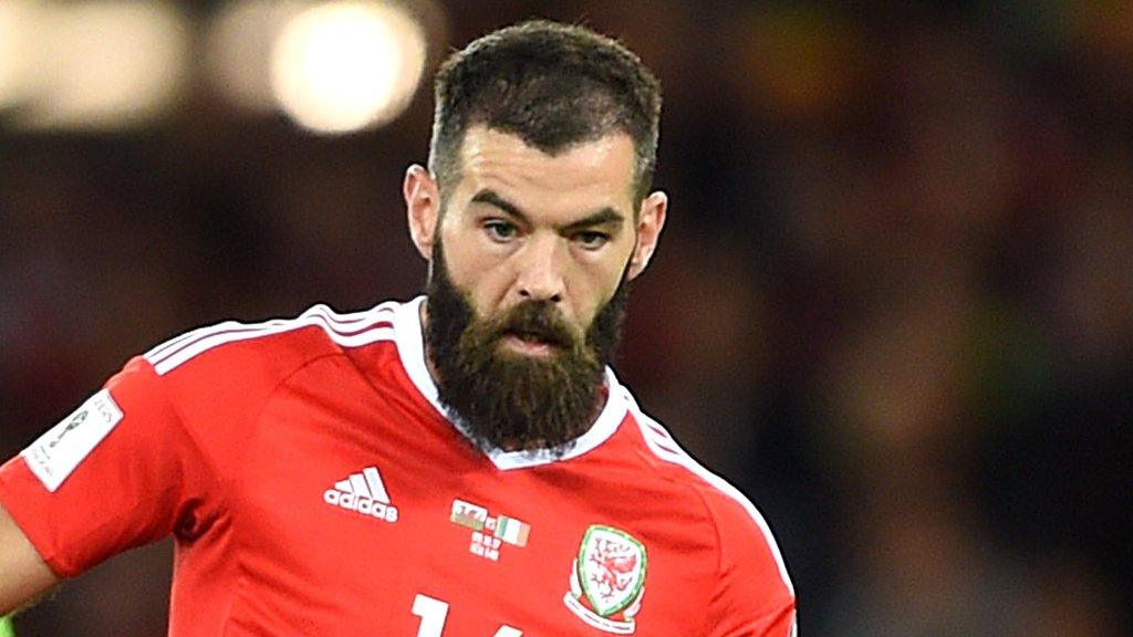 Joe Ledley passes the ball