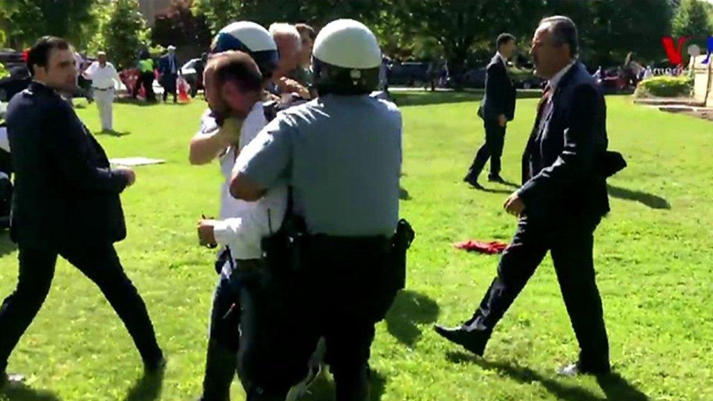 A protester and police.