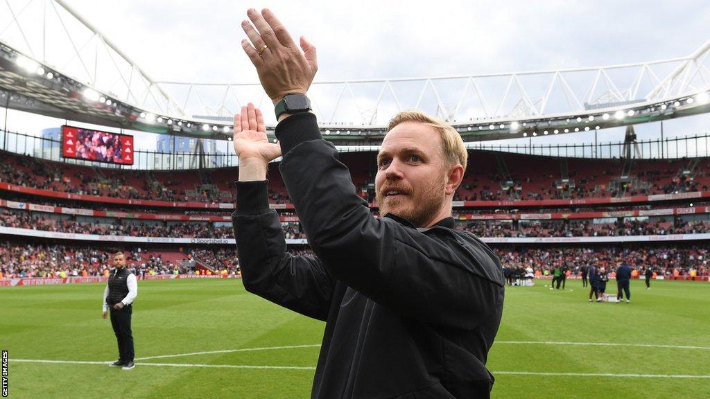 Arsenal manager Jonas Eidevall applauds the home support at the Emirates